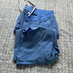 Gently used set of figs scrubs